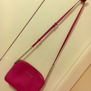 Michael Kors fuchsia colored purse
