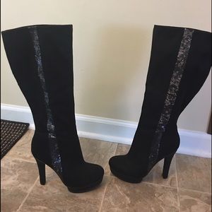 Jennifer Lopez knee high, heeled boots