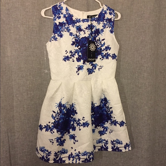 White dress with blue floral print