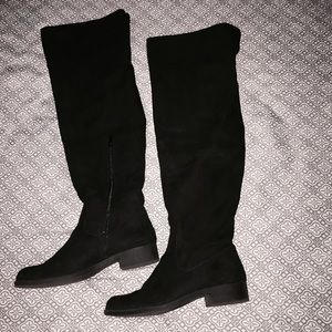 Thigh high (over the knee) boots.