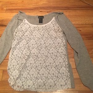 A light long sleeved shirt with floral design