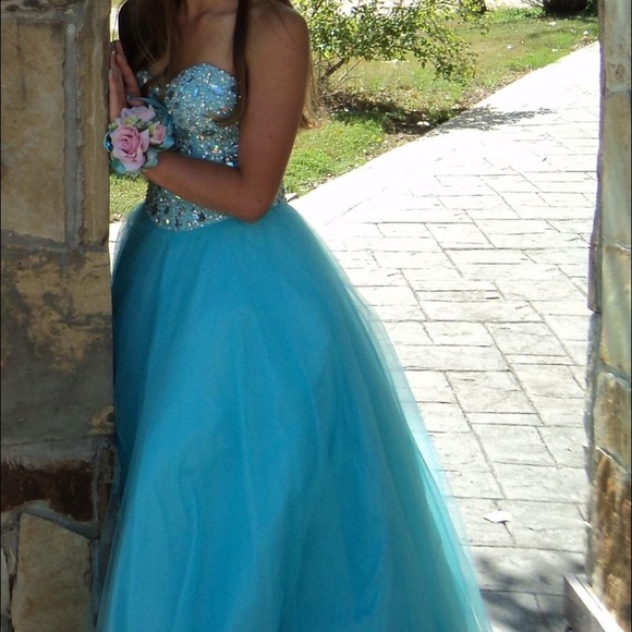 Blue jeweled prom dress