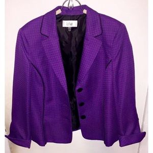 Women's dress jacket and skirt outfit.