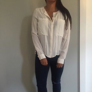 Anthropologie button up top and Dolan top