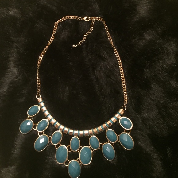 A gold and Turquoise necklace