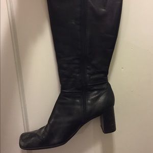 Mid calf leather black heeled boots