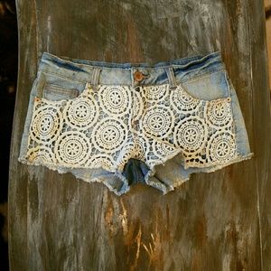 Low rise lace denim shorts