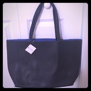 Macys black tote with blue inside. Brand new!