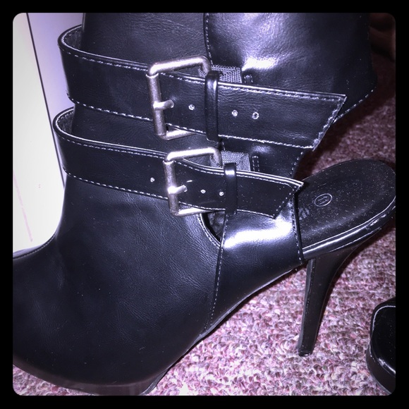 Never worn black heels.