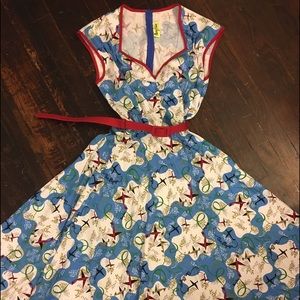Pinup Couture 1940's-style airplane print dress.