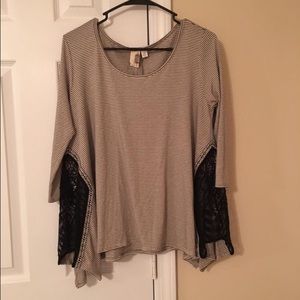 Francesca's flowy striped shirt.