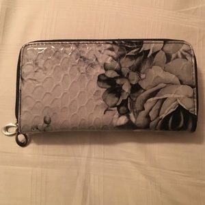 Black and white floral wallet.