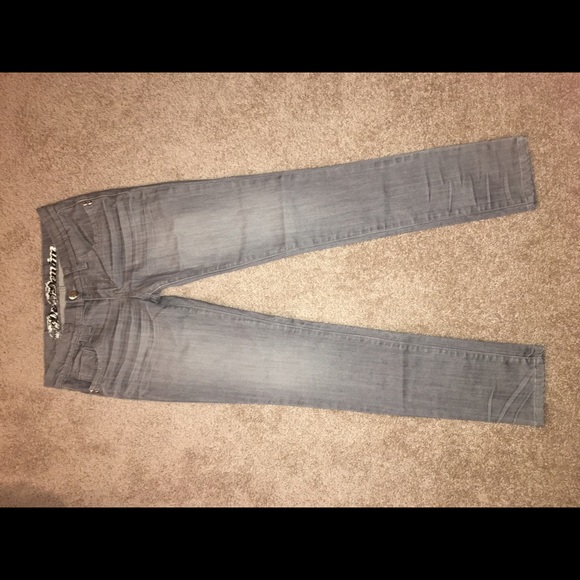 Gray jean with silver studs on back pockets. - Picture 1 of 4