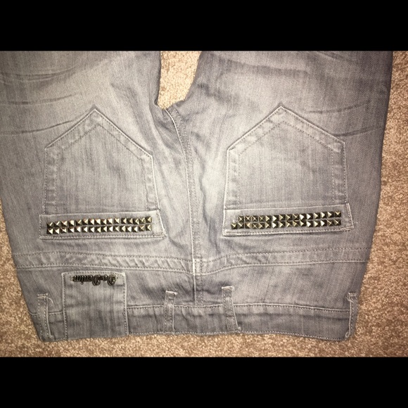 Gray jean with silver studs on back pockets. - Picture 3 of 4