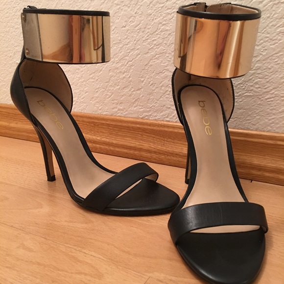 Black Bebe heels with gold cuff