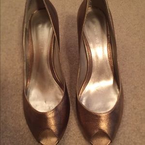 Nine West gold open toe kitten heels.