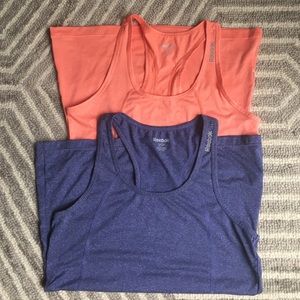 Pair of Reebok running / athletic tanks