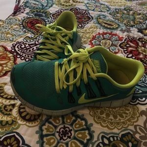 Nike teal and electric yellow free runs