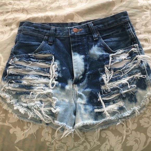 Vintage distressed high wasted Wrangler cut offs.