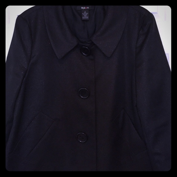Black swing coat.