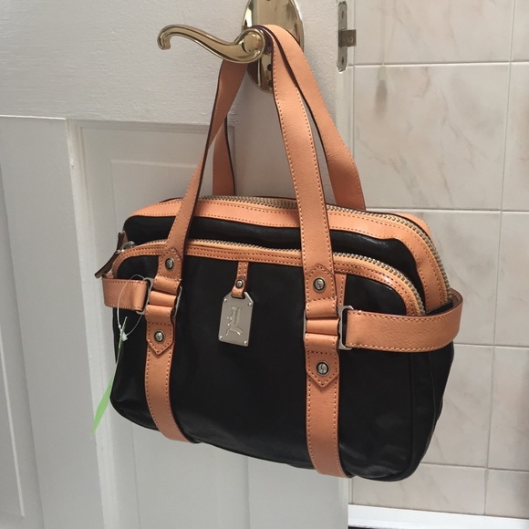 New LAMB Gwen Stefani black medium size handbag.