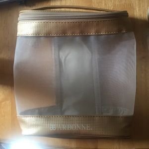 Arbonne gold zipper bag