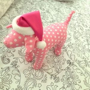 Pink dog with Santa hat