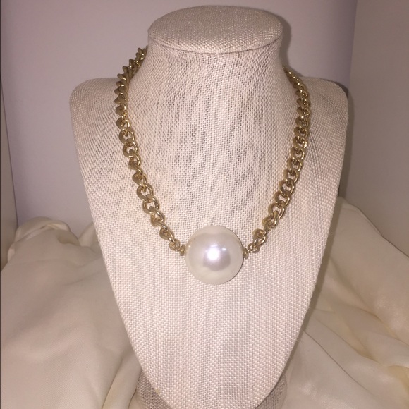 Gold with a big pearl ball necklace