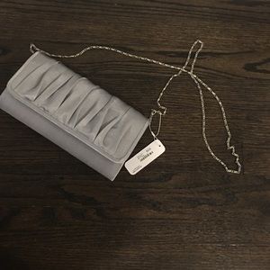 Gray/silver clutch from charming Charlie's w/ tag