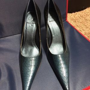 Beautiful brand new metallic blue heels.