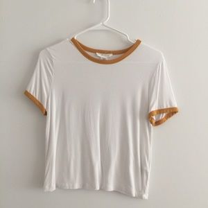 White with mustard trim on collar and sleeves