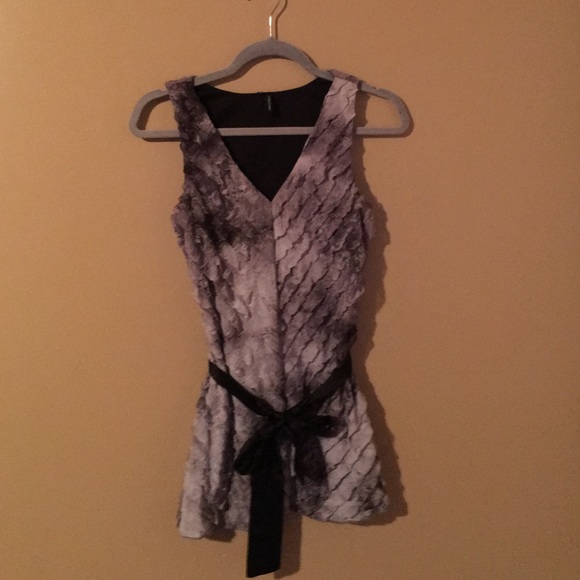 Long bodied no sleeve top