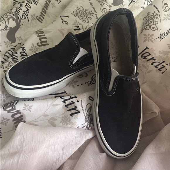 Black Vans slip on style