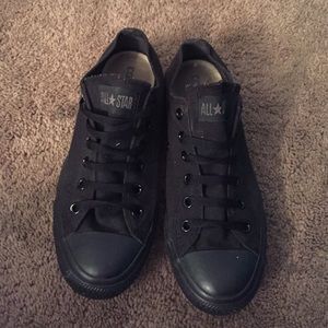 All black converse sneakers.