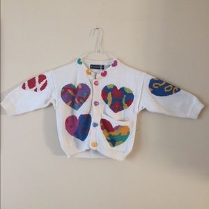 A Christine Foley children's sweater with hearts