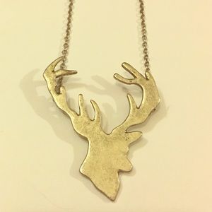 Silver tone deer head silhouette necklace