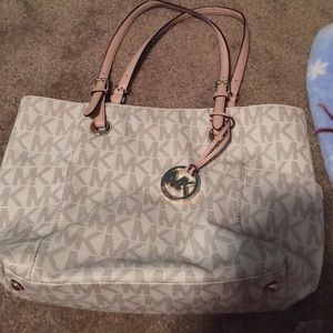 Michael joes cream colored purse