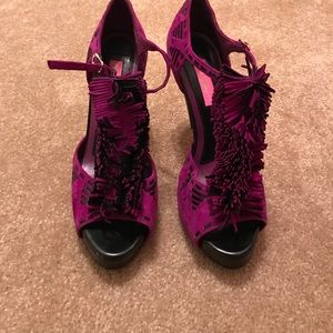 Purple and black besty heels