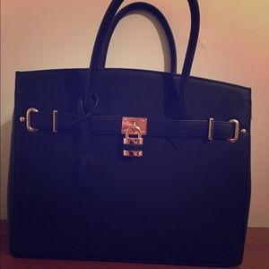 Large brand new black handbag