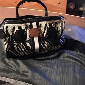 Black and white top handle bag