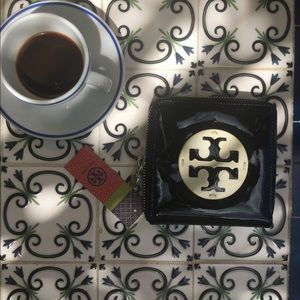 Tory Burch patent leather black french wallet.