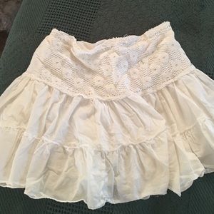 White mini with flower and sequence detailing