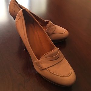 Heeled loafers in neutral beige go with anything!