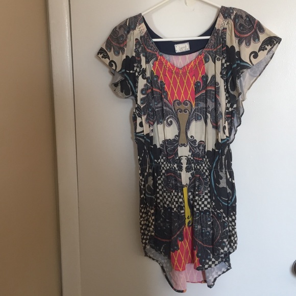 I'm selling a multi-colored, printed Miss Me tunic