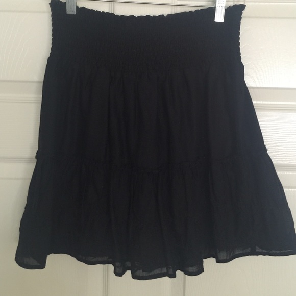 Black mini ruffled skirt with stretch waist band