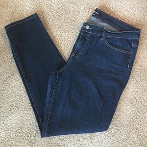 Dark wash, tan stitched skinny jeans