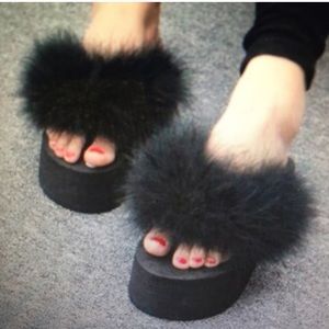Fluffy platformed flip flops