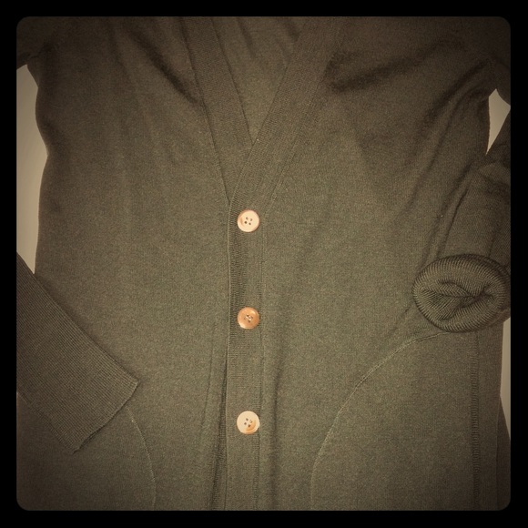 Dark green wool sweater with buttons and pockets