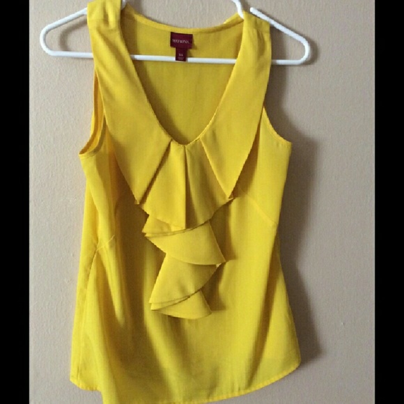 Yellow ruffled blouse