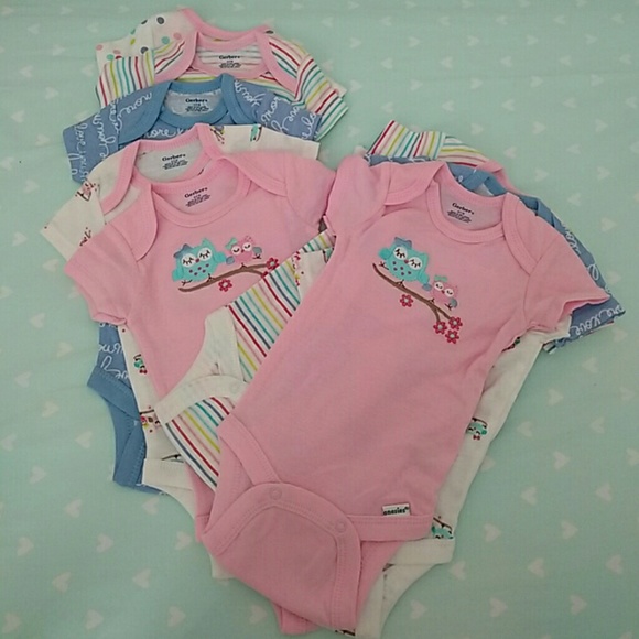 New w/o tags, 2 sets of onesies. total of 10.